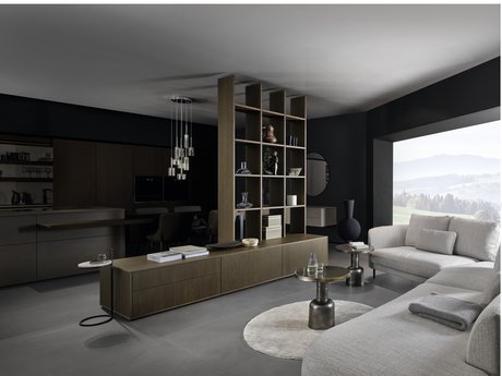 Wohnzimmergestaltung mit Sideboard und offenem Regal aus Raumtrenner